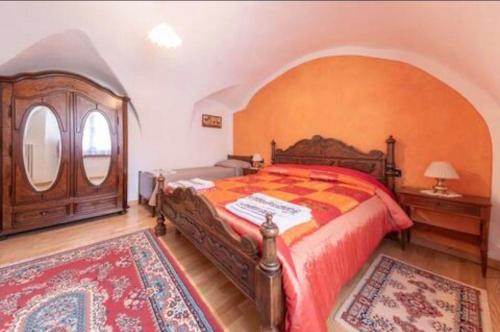 Giường trong phòng chung tại Coromiga le Stelle