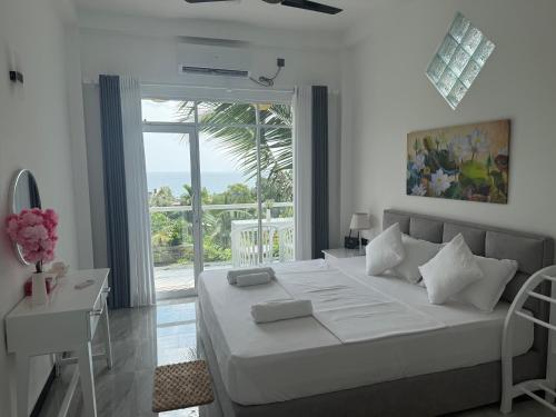 Postel nebo postele na pokoji v ubytování Seaview Mountain Villa