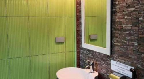 Ένα μπάνιο στο Sweet Garden Home Resort