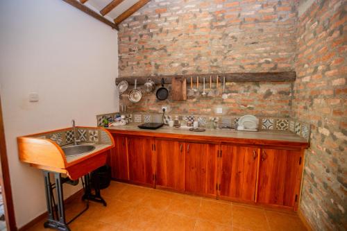 Una cocina o cocineta en The Coastal Village Cabanas