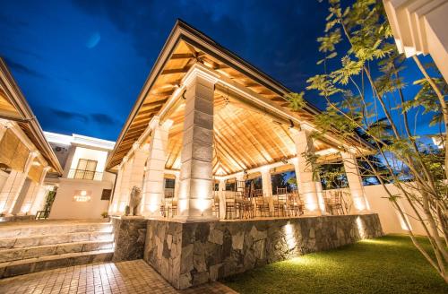 an exterior view of a house at night at Kevans Casa in Mahiyangana