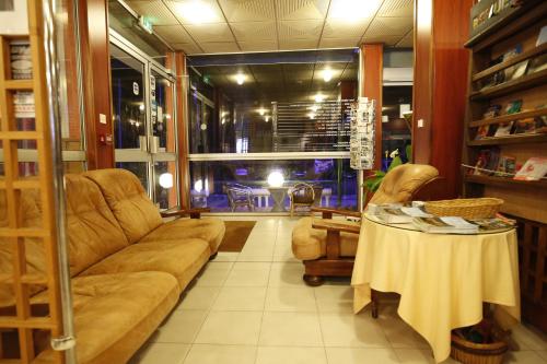 Χώρος καθιστικού στο Hôtel La Rocade