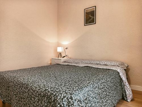 Postel nebo postele na pokoji v ubytování VUT Pozo de los humos