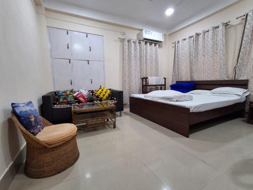 Postel nebo postele na pokoji v ubytování Dorika Homestay, Guwahati
