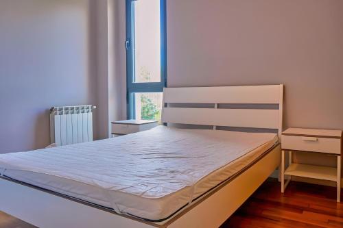 En eller flere senge i et værelse på Mymogrohome