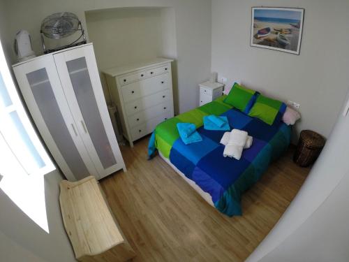 En eller flere senge i et værelse på DescubreHome Sacramento