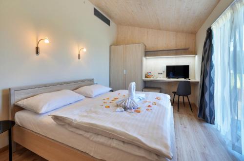 Postel nebo postele na pokoji v ubytování Green Inn Hotel