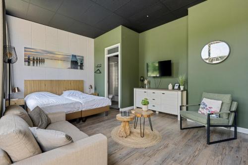 Postel nebo postele na pokoji v ubytování RCN Vakantiepark Toppershoedje