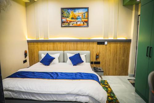 Postel nebo postele na pokoji v ubytování Hotel Shri Ram Ratan Inn