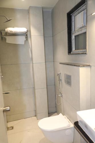 Koupelna v ubytování Hotel Shri Ram Ratan Inn