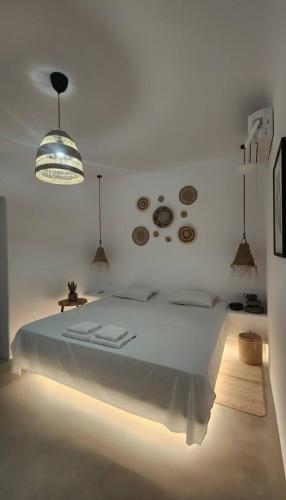 Кровать или кровати в номере Elegant Mykonos 3 Bd Villa w Private Swimming Pool