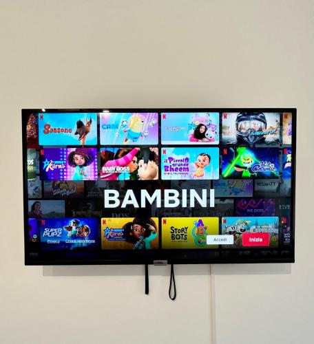 a flat screen tv hanging on a wall at Skyscraper 11 in Cinisello Balsamo
