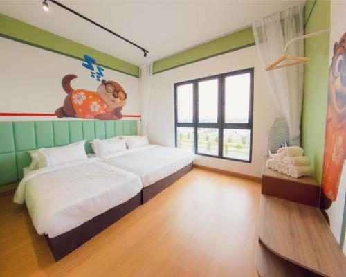 Postel nebo postele na pokoji v ubytování MayaBay Homestay near KLIA SplashMania at Gamuda Cove by GL Play
