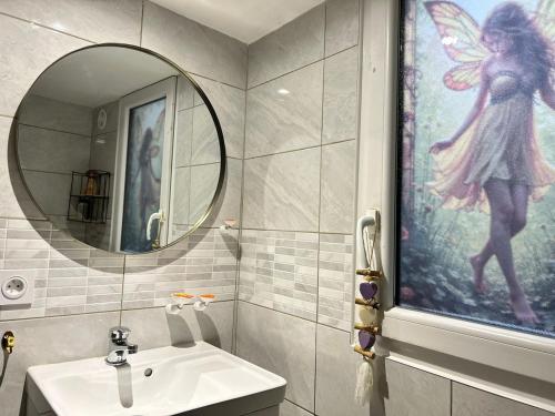 Phòng tắm tại Le Cabanon des Fées, féérique et authentique