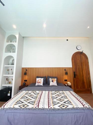 Postel nebo postele na pokoji v ubytování Semasa Villa Purwokerto