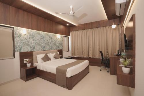 Postel nebo postele na pokoji v ubytování High Five Hotels