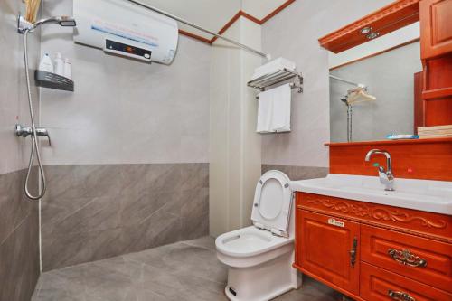 Un baño de Xuexiang zhanglicheng homestay