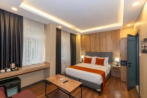 Giường trong phòng chung tại hotel La Vitrine