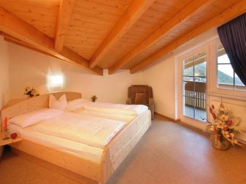 Ένα ή περισσότερα κρεβάτια σε δωμάτιο στο Residence Sonneck