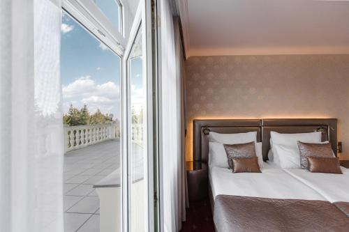 Postel nebo postele na pokoji v ubytování Hotel SEN