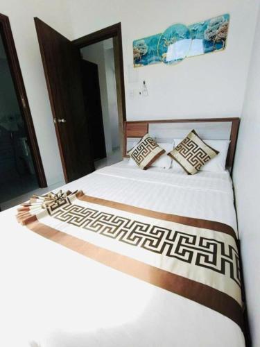 Giường trong phòng chung tại H&Kim Homestay