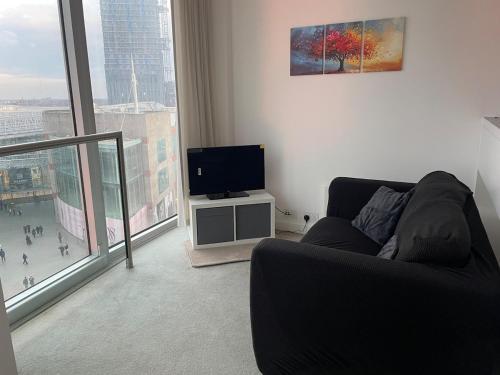 Et tv og/eller underholdning på Cosy city centre apartment