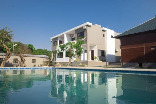 Swimmingpoolen hos eller tæt på Vila Luísa Bilene