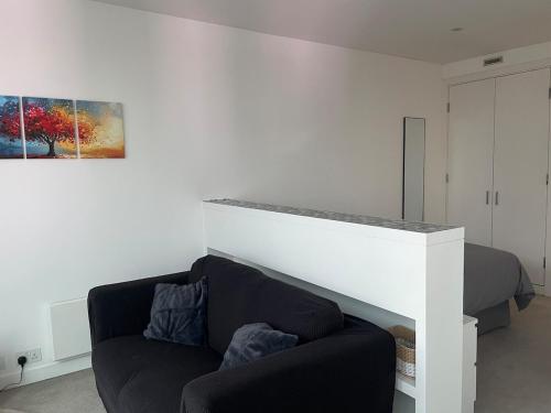 Et opholdsområde på Cosy city centre apartment