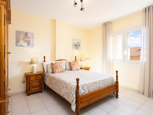 Ένα ή περισσότερα κρεβάτια σε δωμάτιο στο Live Candelaria Atlantic Home