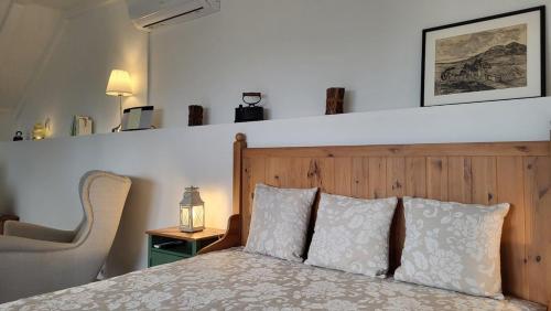 Ένα ή περισσότερα κρεβάτια σε δωμάτιο στο Sol Invictus Vendégház