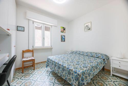 En eller flere senge i et værelse på Villa Padulella - Goelba