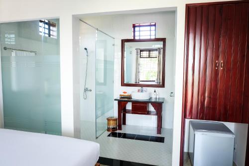Een badkamer bij Unity Villa