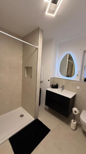 Ванная комната в Ferienwohnung RheinZeit