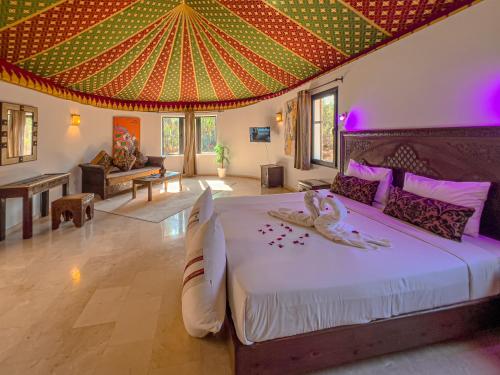 Кровать или кровати в номере Villa Marco Au jardin des senteurs