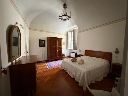 Кровать или кровати в номере La Piscina nel Borgo