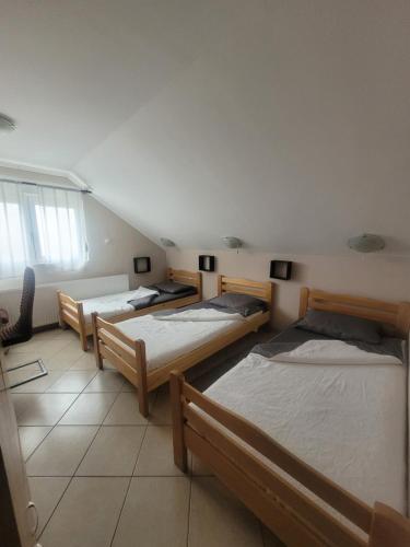 Postel nebo postele na pokoji v ubytování Koba