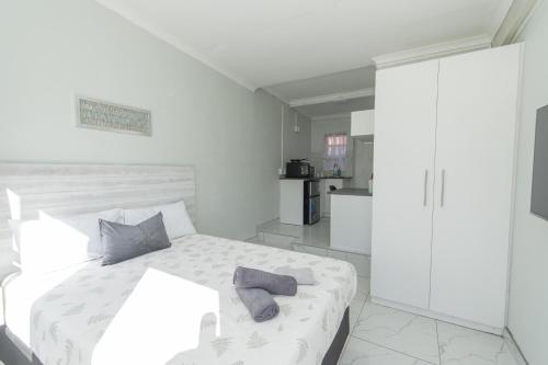 Postel nebo postele na pokoji v ubytování 16 on 7 Guesthouse