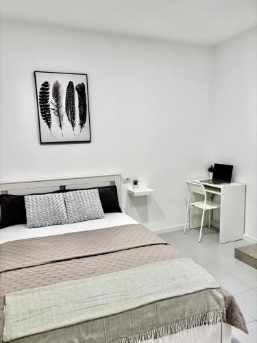 Postel nebo postele na pokoji v ubytování Casa Capitan Coliving Digital Nomads