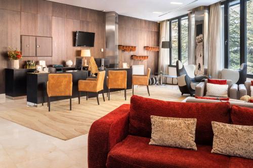 Un televizor și/sau centru de divertisment la Meliá Sol y Nieve