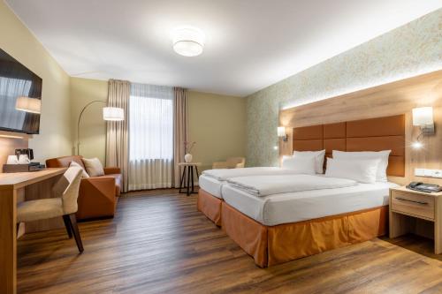 Postel nebo postele na pokoji v ubytování Hotel Engel