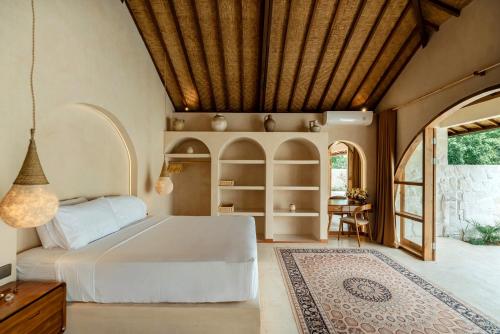 En eller flere senge i et værelse på Uludream