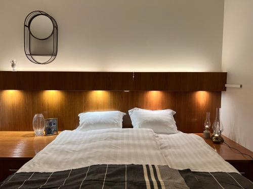 Llit o llits en una habitació de Hotel Glymur