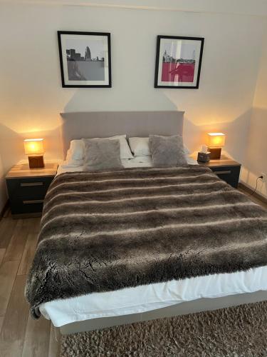 Кровать или кровати в номере Les 4 Elements