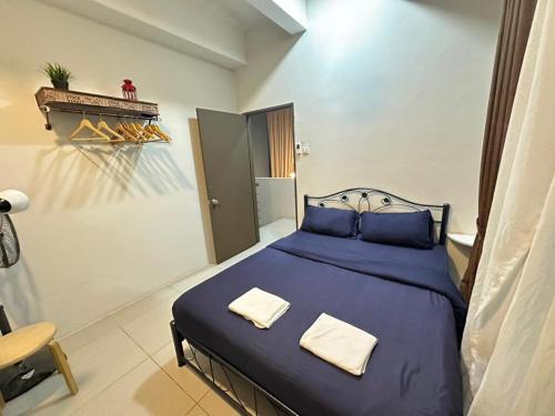 Giường trong phòng chung tại Apartment Penthouse Golden Hill