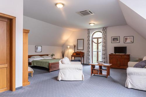 Postel nebo postele na pokoji v ubytování Penzion Platan