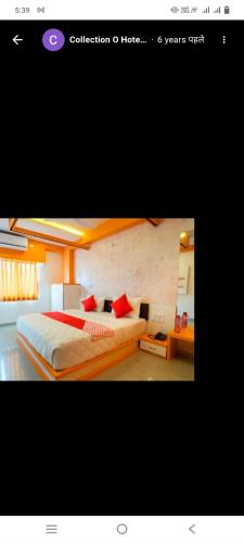 a picture of a bedroom with two beds at Hotel paladise in Ahmedabad