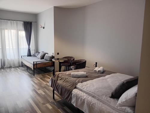 Postel nebo postele na pokoji v ubytování Magic View Hotel