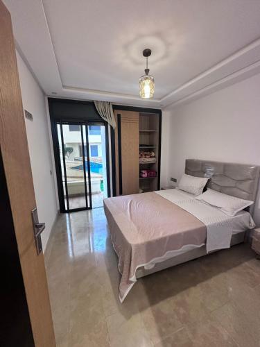 Ένα ή περισσότερα κρεβάτια σε δωμάτιο στο Résidence Macha'allah