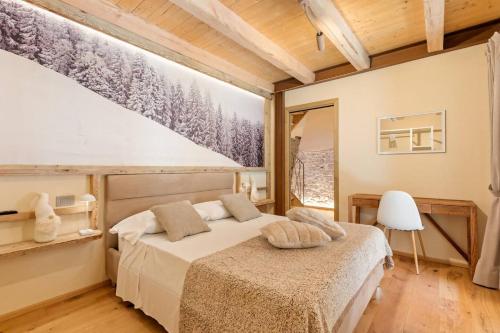 Ένα ή περισσότερα κρεβάτια σε δωμάτιο στο Godioz Suites - Aosta Valley
