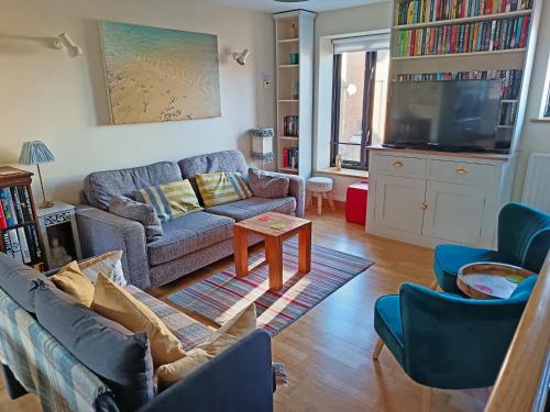 Posezení v ubytování Crab Cottage